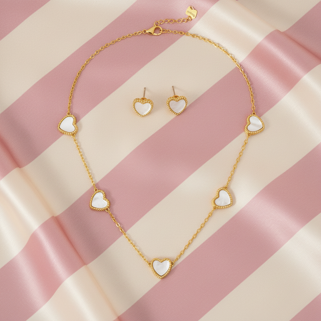Set cœurs nacre - vue dessus - fond rayé rose crème