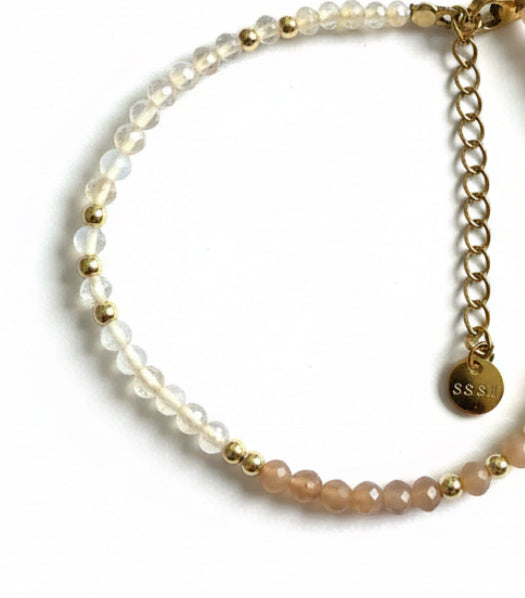 Bracelet perles précieuse pêche/nude