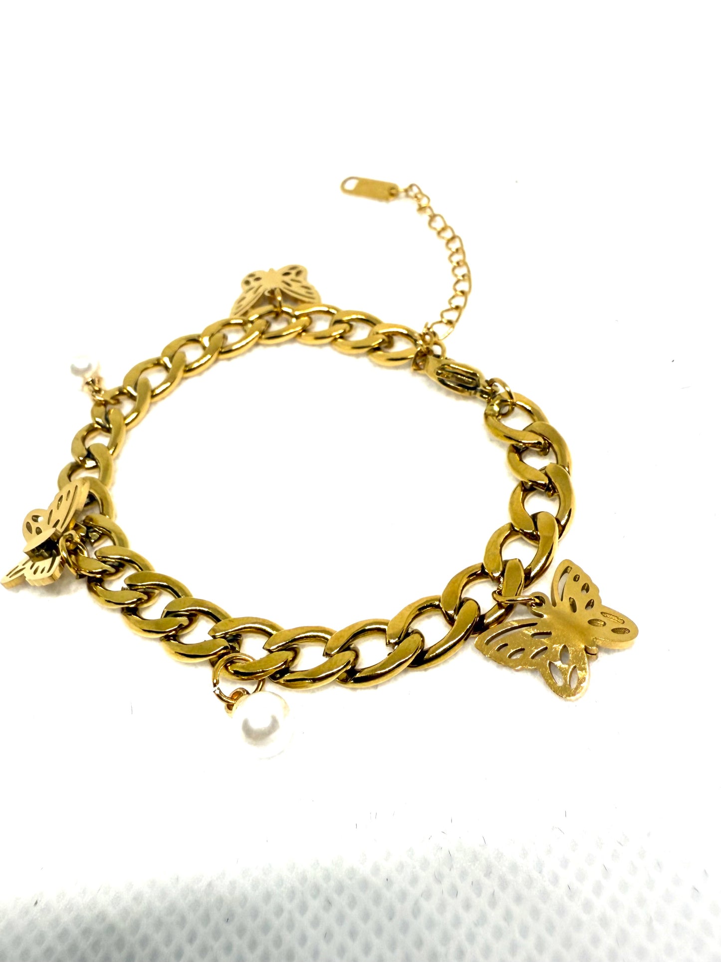 Chaîne breloque papillon d’or