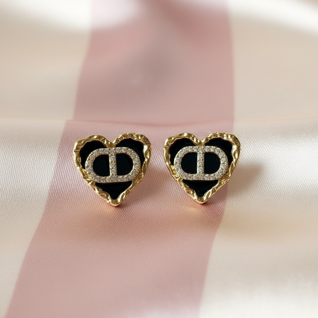 Boucles cœur noir doré - vue de face