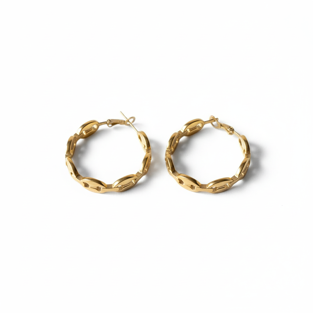 Boucles d'oreilles créoles graine d'or - vue de dessus