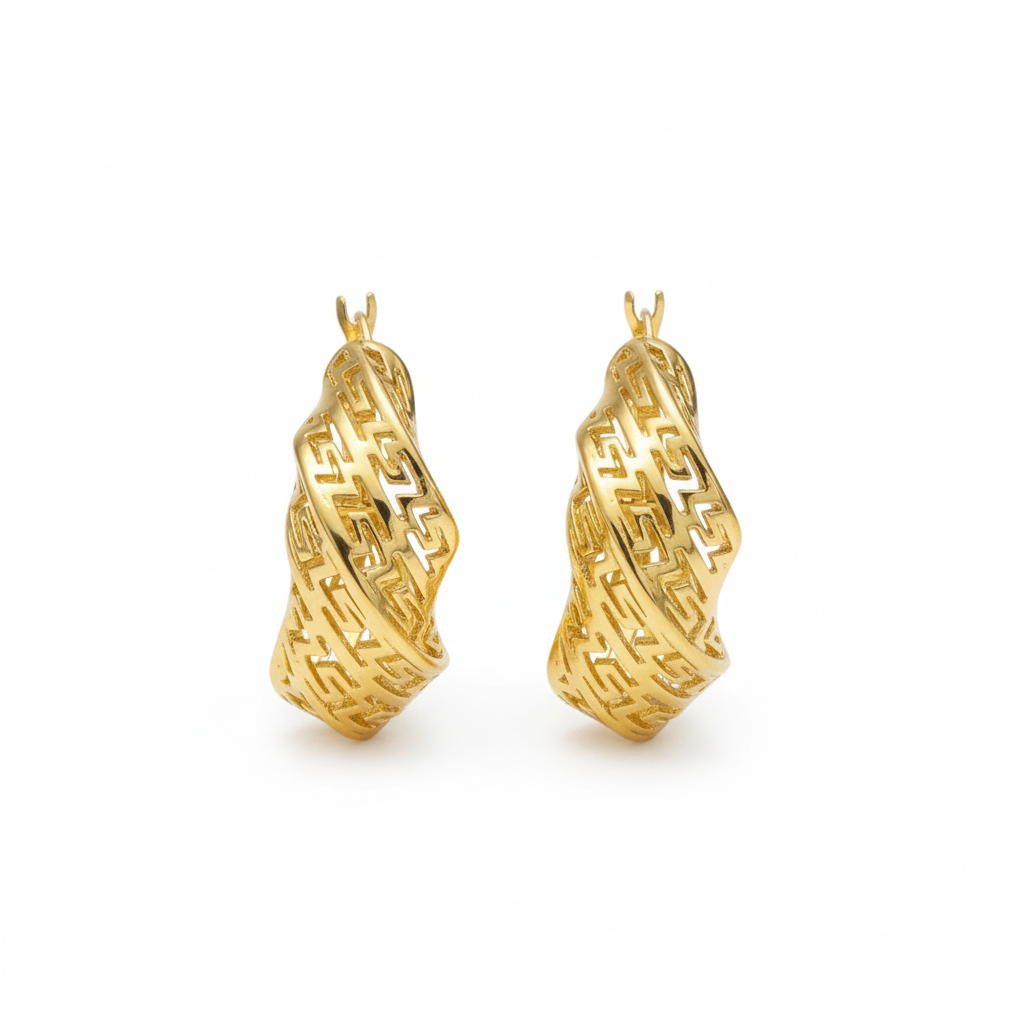Boucles d'oreilles grecques sur fond blanc