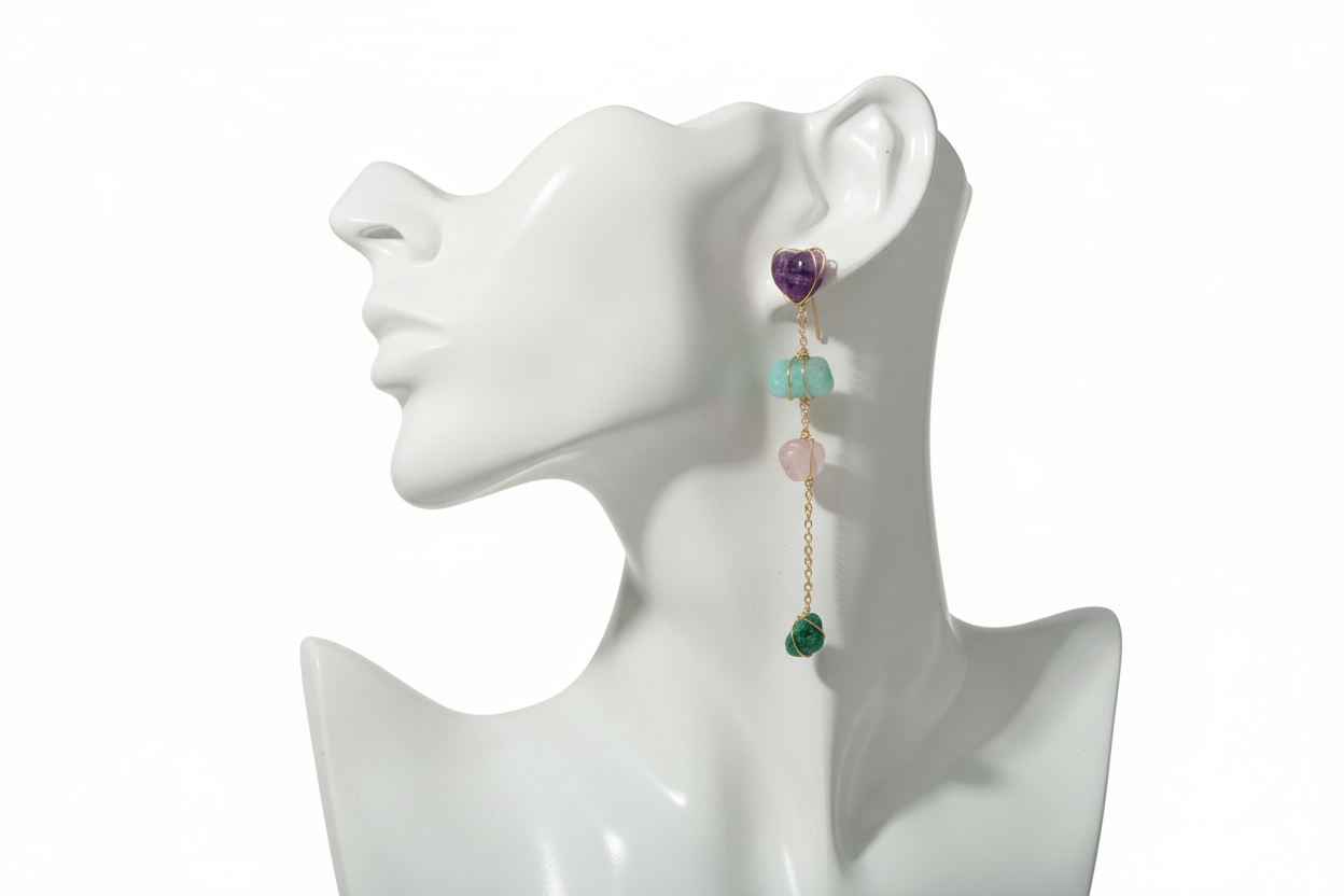 Boucles d'oreilles pierres précieuses sur buste vue 1