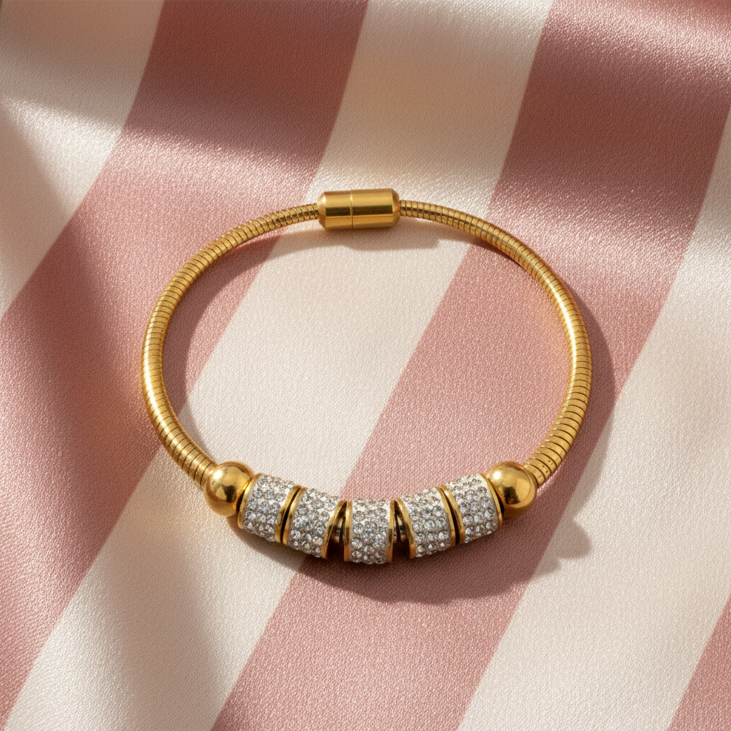 Bracelet doré cristaux - fond rose rayé