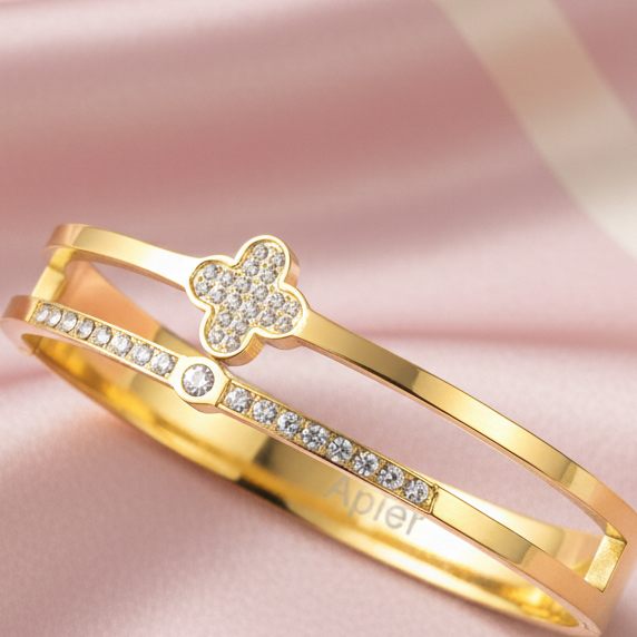 Bracelet double jonc trèfle - fond rose poudre