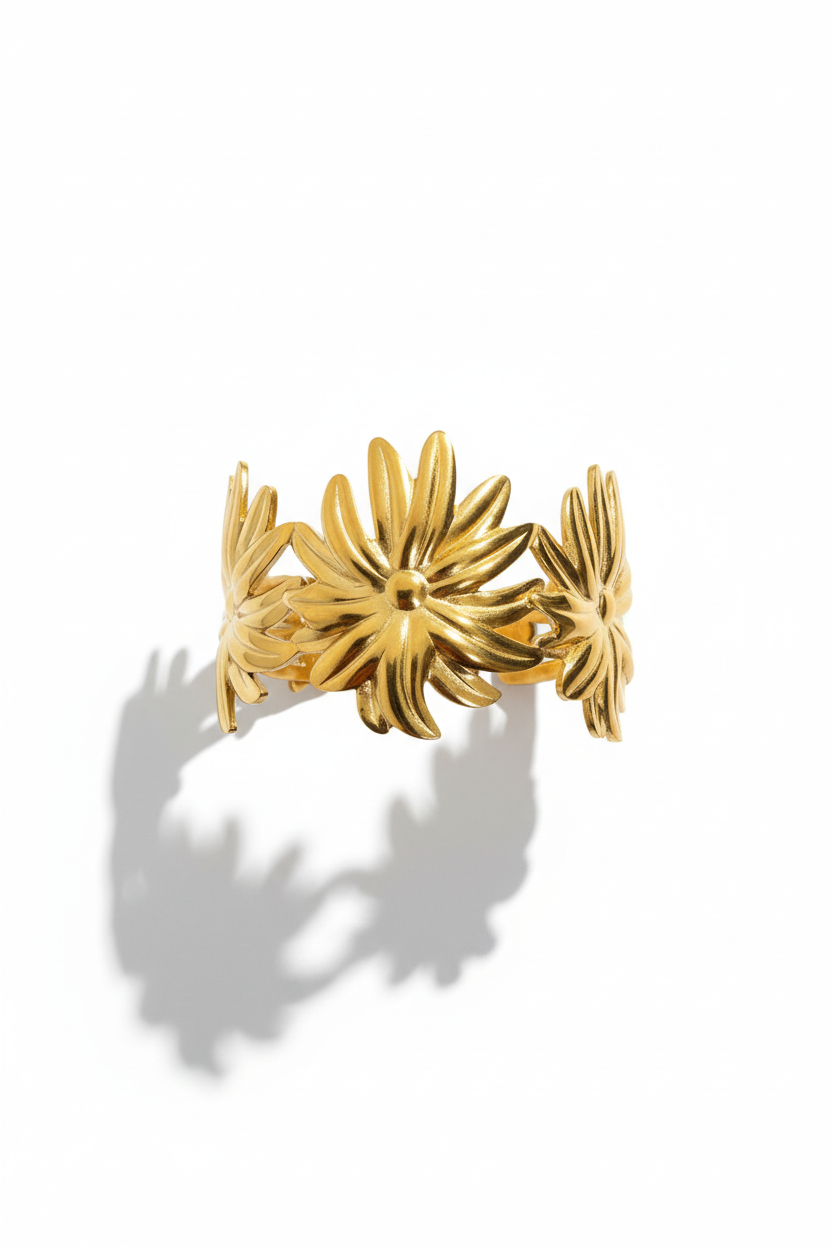 Bracelet manchette fleurs tiare vue dessus fond blanc