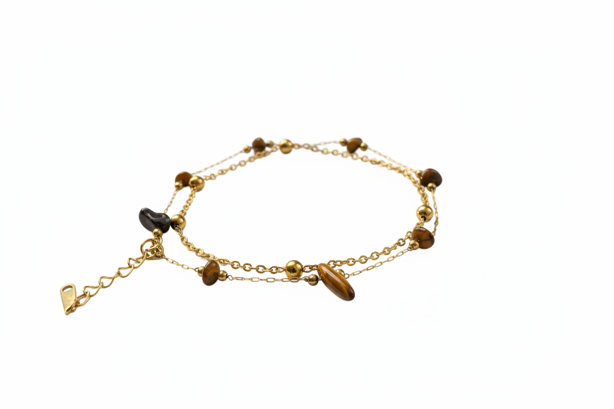 Chaîne cheville perles marron fond blanc