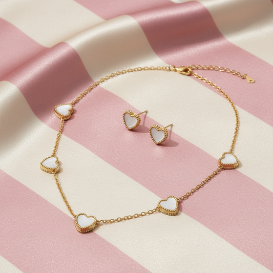 Set cœurs nacre - vue inclinée - fond rayé rose crème